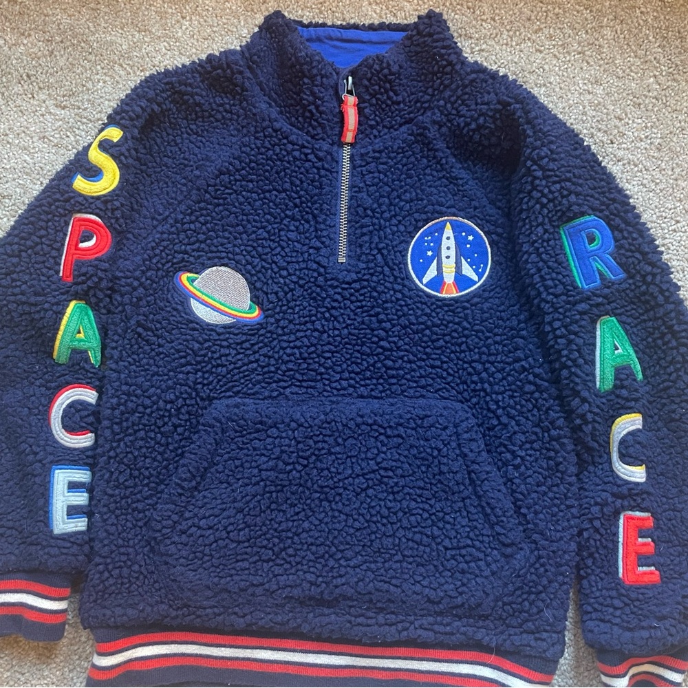 Mini-Boden boys “Space Race” navy fleece quarter-zip.